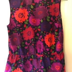 Peplum bold floral print top